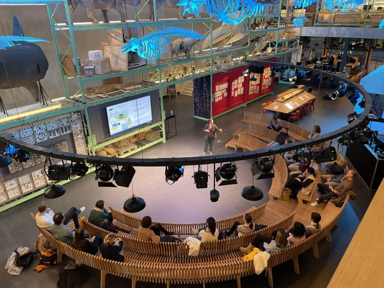 Margaret Gold gives a presentation about citizen science in LiveScience